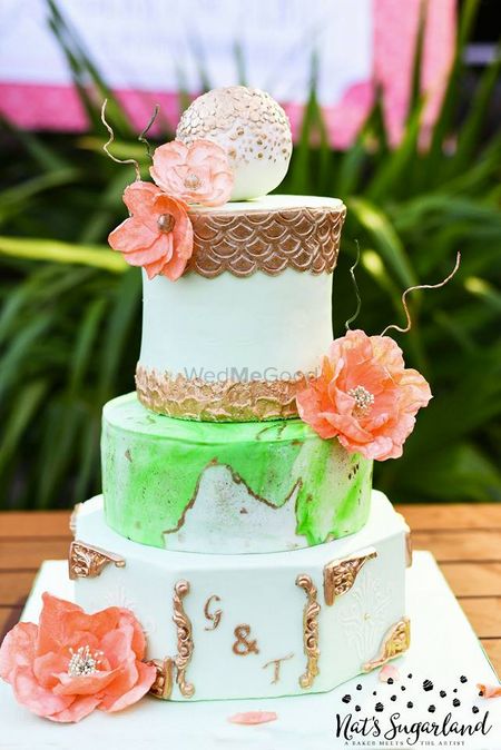 Photo of Wedding cake in white with flowers