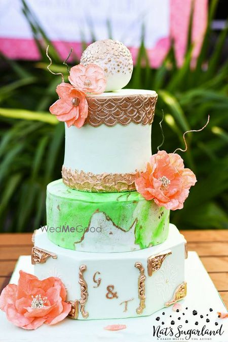 Photo of Wedding cake in white with flowers