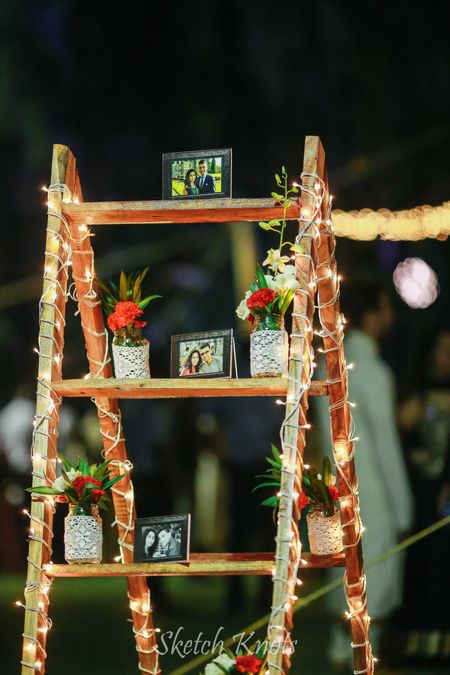 Wooden ladder in decor with lights and personalized elements