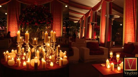 Photo of red and gold theme candle lit decor