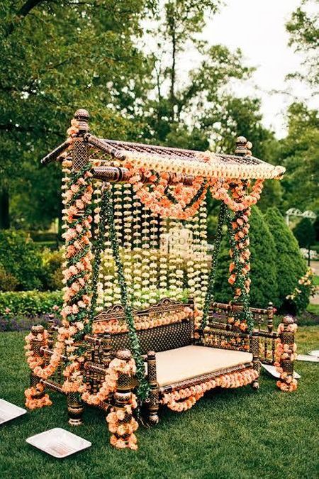 Stunning swing with floral decor for mehndi 