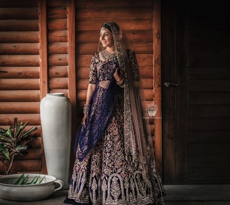 Ink blue and gold embroidered bridal lehenga