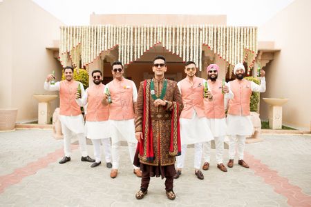 Offbeat groom sherwani with groomsmen 