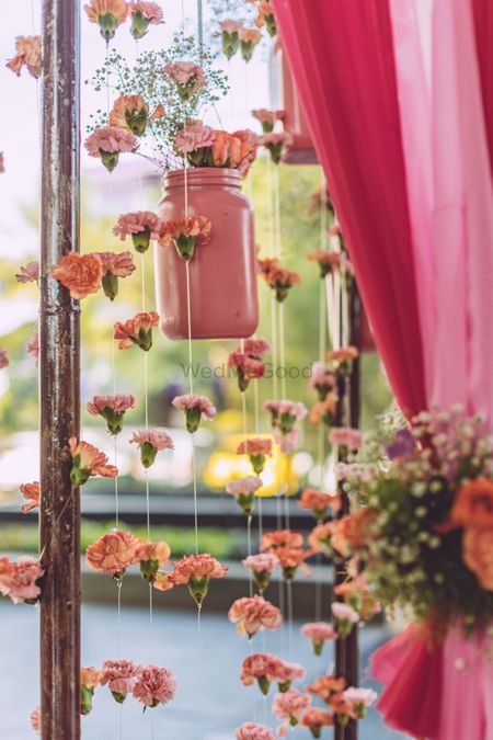 Hanging jars with flowers in decor
