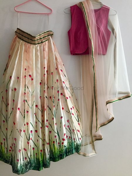 Photo of hand printed cotton georgette lehenga with cherry blossom print and crop top
