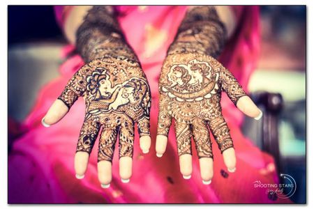 Mehendi with portraits of bride and groom