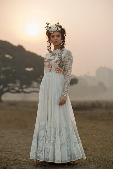 White floor length anarkali with full sleeves and floral embroidery