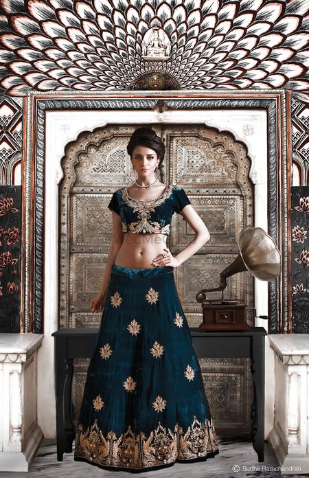 Photo of navy blue bridal lehenga with small motif and short blouse