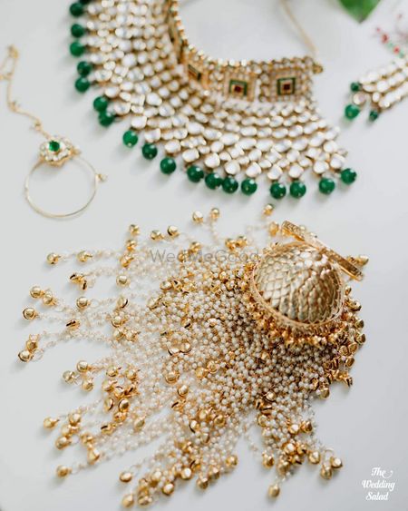 Photo of bridal jewellery photography with gold kaleere