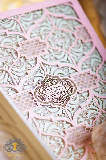 Photo of Light pink and mint laser cut wedding card