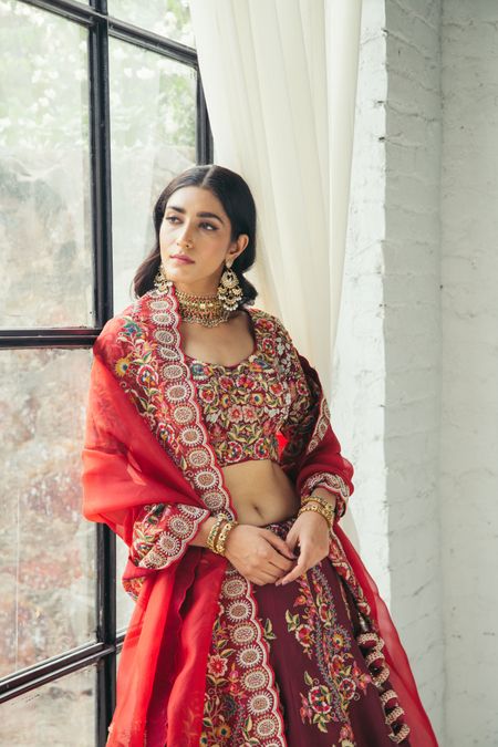 Gorgeous maroon lehenga with a red dupatta