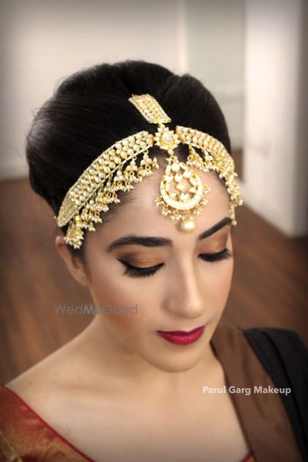 Big bridal mathapatti in light gold finish