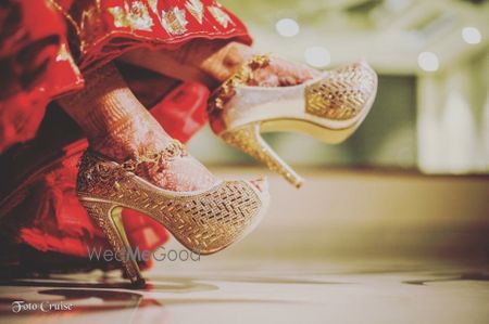 Gold bridal heels with design 