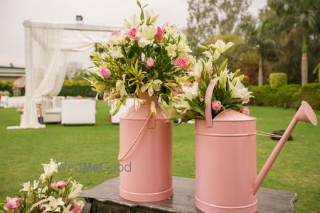 Pink Water Sprinklers and Floral Decor