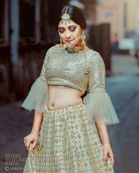 Beautiful light green bridal lehenga with frill sleeves