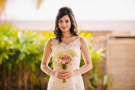 Christian Bride with  Open Hairstyle and Bouquet