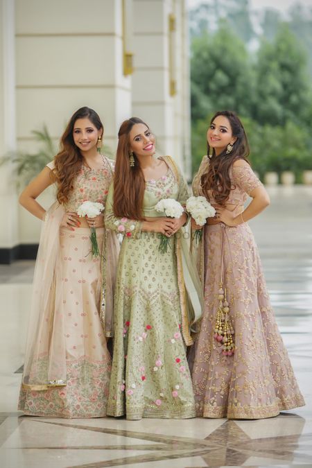Matching bride and bridesmaids in pastel 