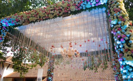 Photo of Mandap decor idea with hanging floral strings