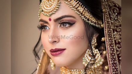 Photo of A close up shot of a bride wearing nude makeup