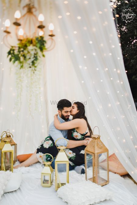 Couple kissing glamping pre wedding shoot idea