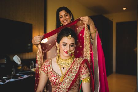 Photo of Pretty Bride while getting ready
