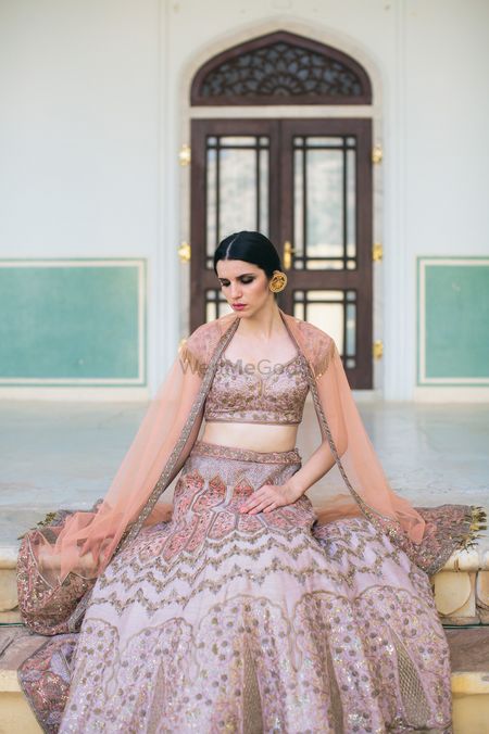 Lilac engagement lehenga with dull gold embroidery