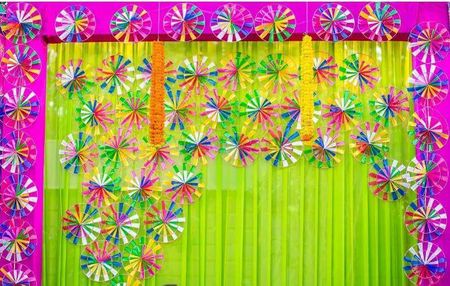 Photo of Colorful paper wheels in decor