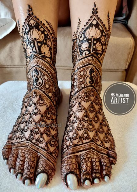 Feet mehendi design with lotus 