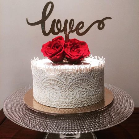 Photo of White Lace Trim Wedding Cake with Roses and Love Topper