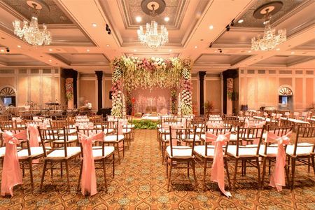 Photo of Pastel Pink Decor with Chandeliers
