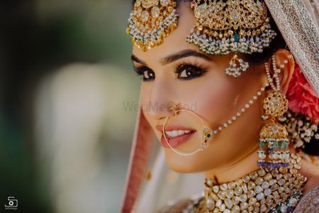Oversized bridal jewellery with Nath and jhoomer