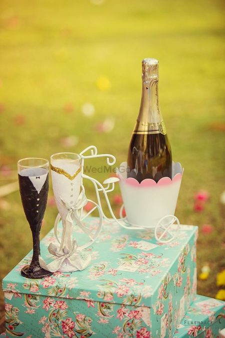 Cute pre wedding shoot props with bride and groom champagne glasses