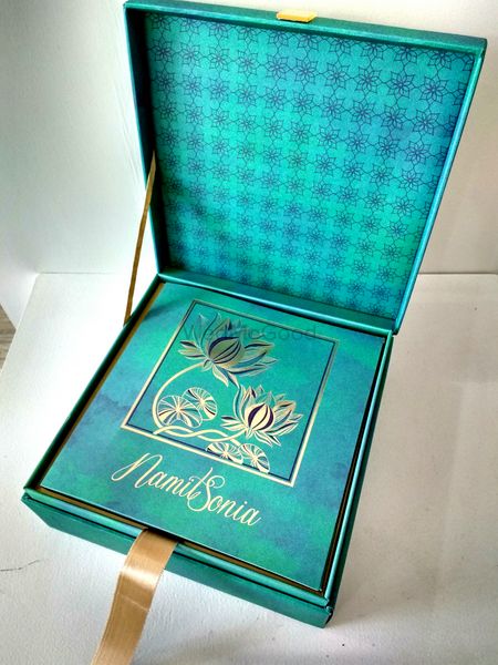 Simple teal wedding invitation in box