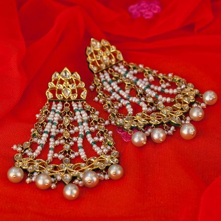 Photo of Gold jhoomer earrings