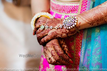 Photo of Bridal haathphool with mehendi