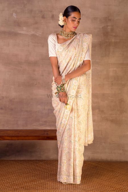 A pastel-hued saree for reception.