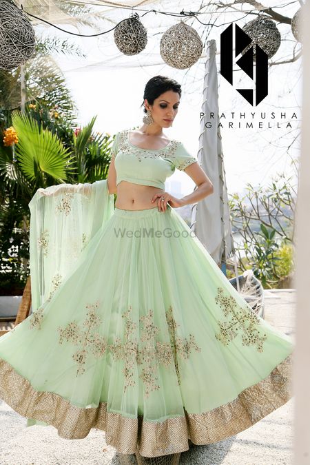 Simple mint and gold lehenga for engagement or sister