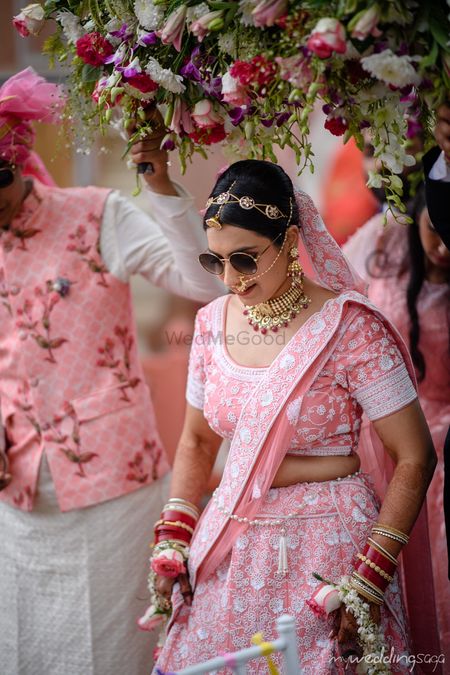 Bride wearing hairband and sunglasses 