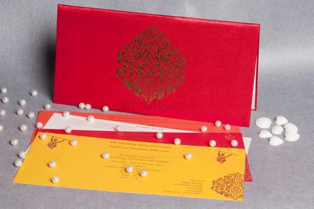 Photo of sold colour wedding invite red and yellow invites