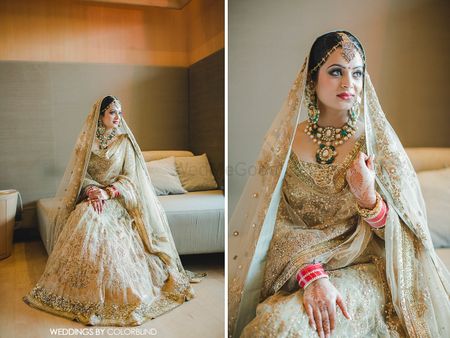 Photo of goldlehenga with atouch of green