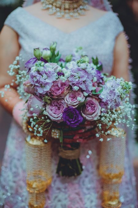 Photo of unique purple bridal bouquet for bride