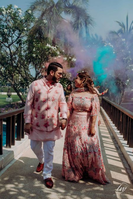 Photo of guests entering with smoke sticks on mehendi