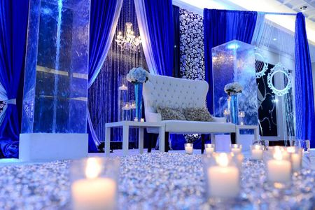 Photo of ice blue and white theme stage decor