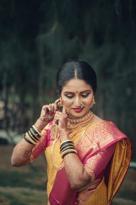 Maharashtrian bride in a bright saree