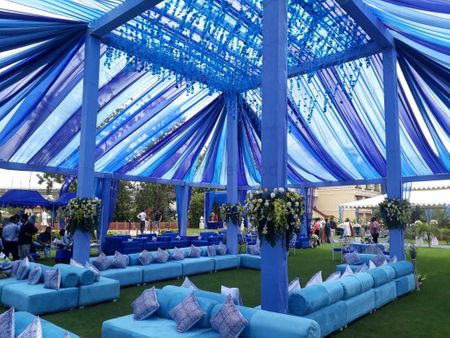 Photo of Vibrant and bright blue decor settings