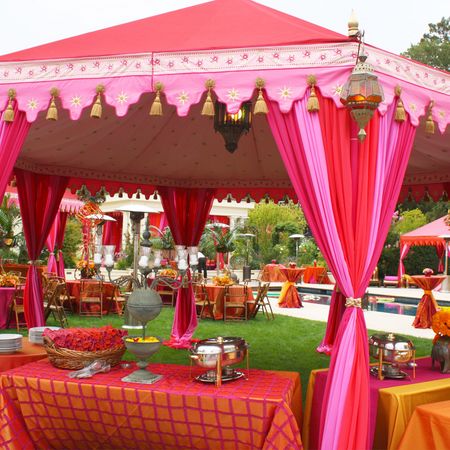 Photo of light pink and red tents