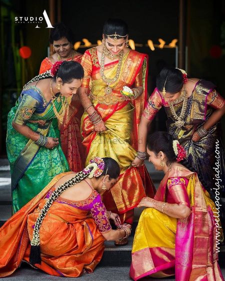 Photo of South indian bride with her sisters on her wedding day