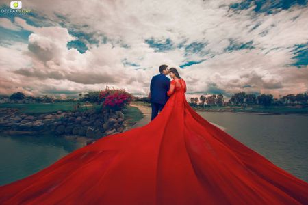 Dramatic bollywood pre wedding shoot with flowing gown