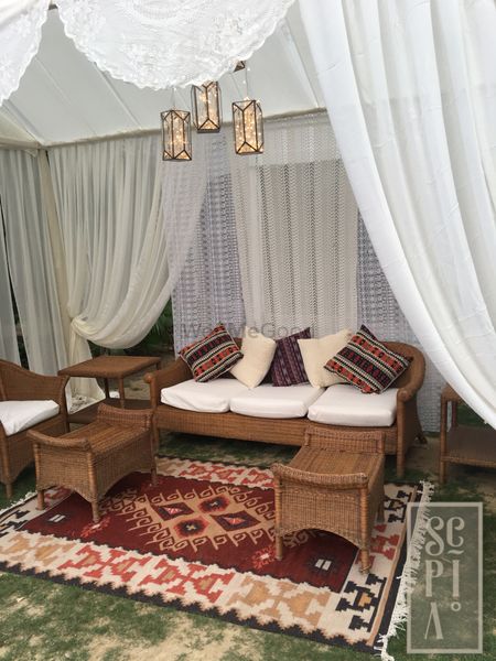 Modern Persian influence decor with rugs and drapes