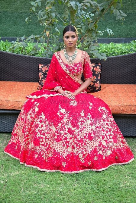 Light bridal lehenga in red with floral embroidery